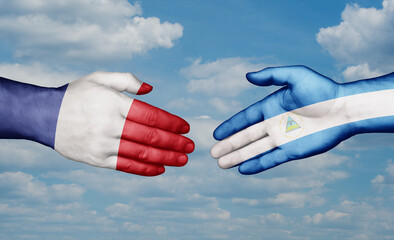 Nicaragua and France country handshaking with flags, consensus concept international co-operation illustration