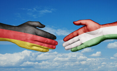 Hungary and Germany country handshaking with flags, consensus concept international co-operation illustration