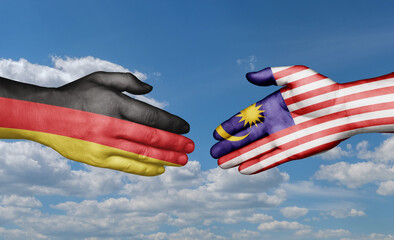 Malaysia and Germany country handshaking with flags, consensus concept international co-operation...