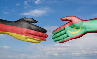Mauritania and Germany country handshaking with flags, consensus concept international co-operation...