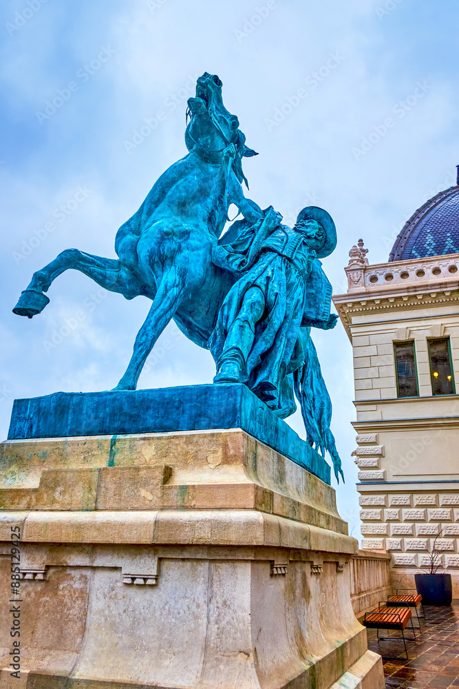 Wall mural The statue to the horse trainer and the Royal Riding Hall of Buda Castle, Budapest, Hungary