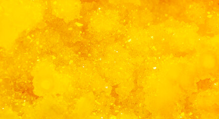 Golden crystal mineral stone. Gems. Mineral crystals in the natural environment. Texture of...