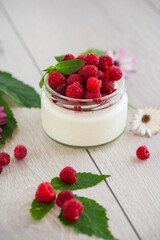 homemade food, milk yogurt with fresh raspberries