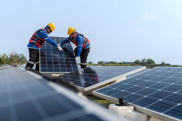 Male workers repair Floating solar panels on water lake. Engineers construct on site Floating solar panels at sun light. clean energy for future living. Industrial Renewable energy of green power.