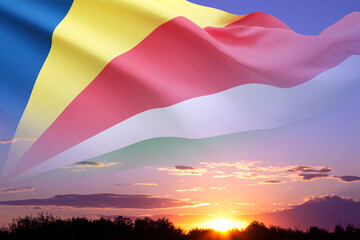 Flag of Seychelles against the sunset. Background for National Holidays