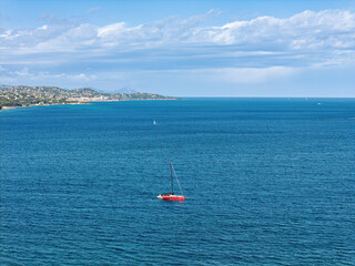 Fototapeta premium Beach with waves in Port Grimaud looking towards Saint Maxime in France in spring, close-up