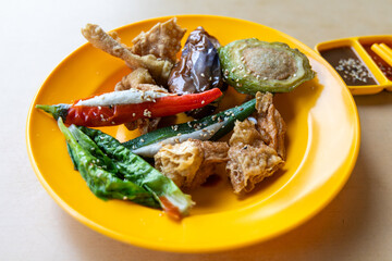 Assorted yong tau fu or tofu, to be dipped with sauces is a favorite food in Malaysia eateries