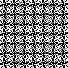 Abstract black figures on a whire background. Seamless texture for fashion, textile design,  on wall paper, wrapping paper, fabrics and home decor. Simple repeat pattern.