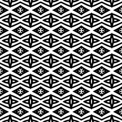 Abstract black figures on a whire background. Seamless texture for fashion, textile design,  on wall paper, wrapping paper, fabrics and home decor. Simple repeat pattern.