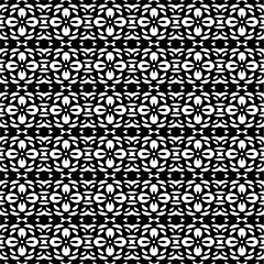 Abstract black figures on a whire background. Seamless texture for fashion, textile design,  on wall paper, wrapping paper, fabrics and home decor. Simple repeat pattern.