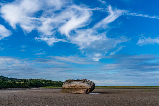 walking around an old ship wreck of City Dulas Anglesey