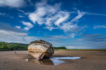 walking around an old ship wreck of City Dulas Anglesey