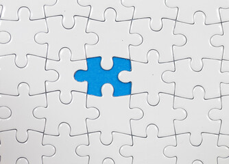 Fototapeta premium Jigsaw puzzle with one piece missing