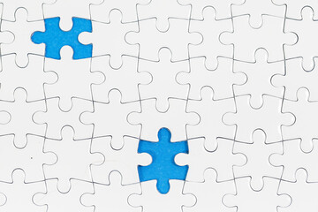 Jigsaw puzzle with one piece missing