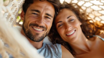 A relaxed couple enjoying a sunny summer day on a hammock, smiling and content, captured in a tranquil outdoor setting, embodying peacefulness and leisure.