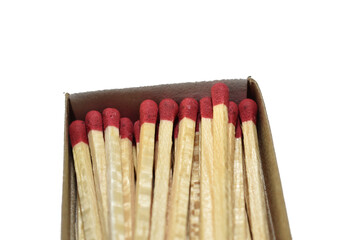 Wooden matches in a box with gray brown color. Close-up.