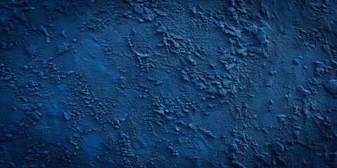 wall painted with blue paint with an interesting texture