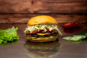 variety of vegan and vegetarian beef burgers casserole with onion cucumber dressings tomato chedar...