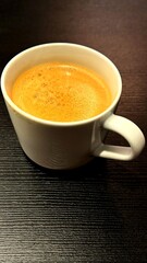 Cup of Hot Coffee on Table.