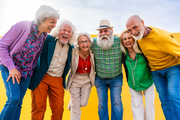 Cheerful elderly friends having fun together