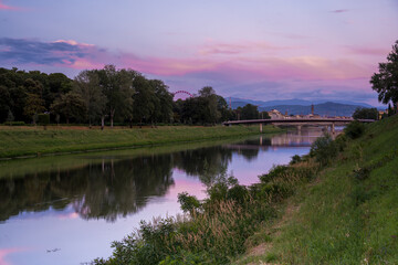 Florence, Italy - June 01, 2024: Amo river suntet.