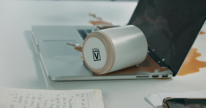 Business, woman and spill coffee on laptop in office for mistake, distraction and accident of work stress. Beverage, liquid damage and technology malfunction in workplace with crisis and hazard.