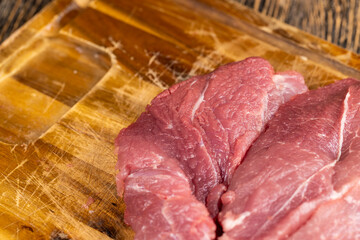 a piece of raw pork before cooking