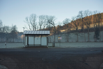 Empty bus stop on a frosty winter morning
