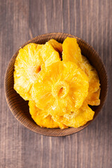 Dried pineapple in a bowl. Dried fruits. 