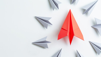 Red paper plane taking different path amid grey planes. Business ideas and leadership creative thinking concept. Think different. Innovation and solution concept. Copy space.