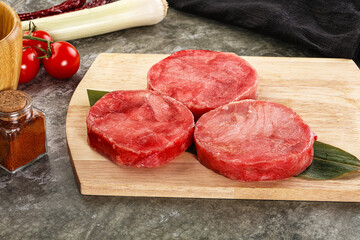 Delicous raw tuna medallion for cooking