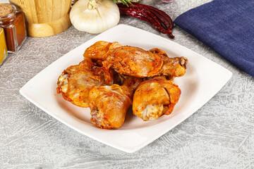 Raw marinated chicken drumstick for cooking