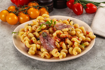 Italian pasta cellentani with anchovy