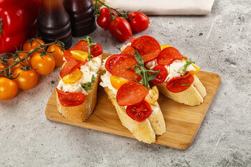 Bruschetta tapas with chorizo and tomato
