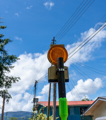 red flashing light at daytime