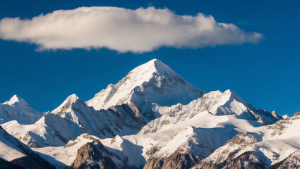 Majestic Mountain Range with Snow-Capped Peaks and Clear Blue Sky