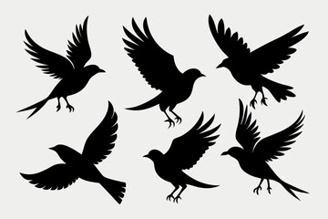 A set of bird in flight silhouette black vector artwork illustration