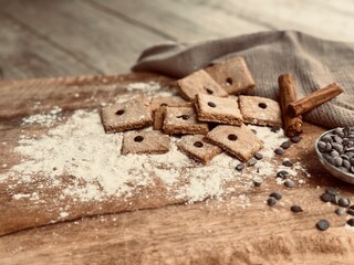Freshly baked oatmeal biscuits with chocolate chips.
