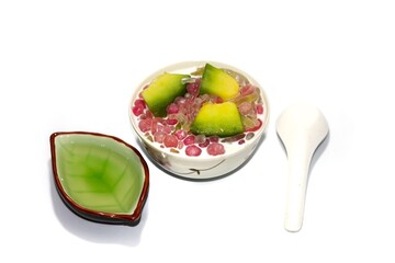 Sweet and delicious with dessert of Thailand served with melon slices for topping,isolated concept.