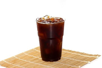 Americano ice coffee put on bamboo mat in white background.isolation concept.