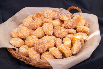 Puff pastries, round sugar-coated sugar puffs, golden crispy baked sweets, traditional French patisserie, biscuits