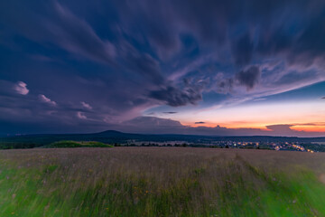 Sunset near Bozi Dar town in summer hot evening before storm