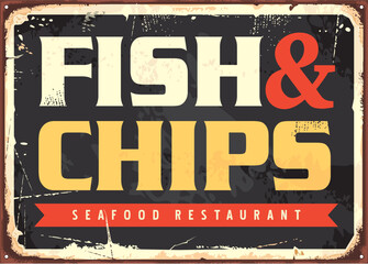 Fish and chips retro fast food restaurant sign with creative colorful inscription on black background. Fried fish and potatoes vintage vector illustration.