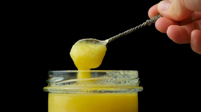 Natural ghee healthy oil, black background