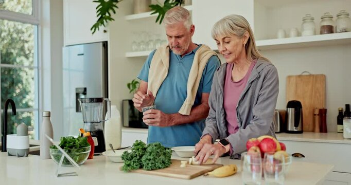 Blender, fruits and mature couple with healthy food for diet, detox and breakfast drink in kitchen at home. Vegan, wellness and nutrition with man and woman helping to prepare ingredients or smoothie