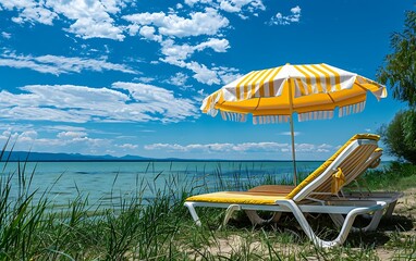 Beach chair and umbrella on the shore of Lake Balaton, Hungary