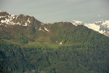 Landscape of valley with fog in the austrian village Bramberg near the mountain Wildkogel