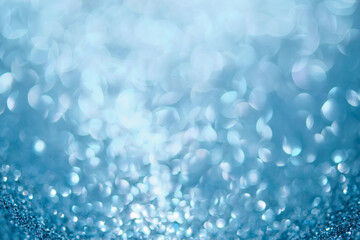 Abstract blue festive christmas background with bokeh.