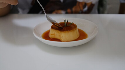 Egg Pudding on White Plate 