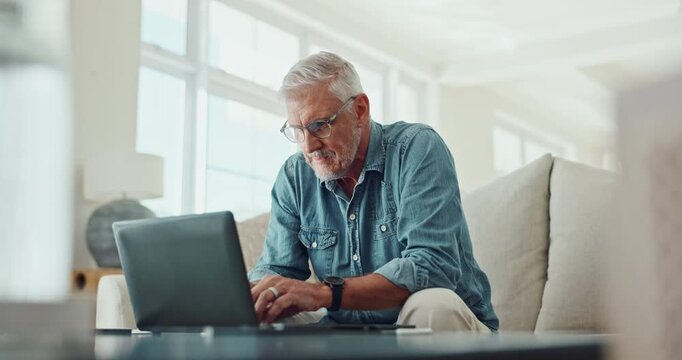 Mature man, home and winning on laptop with virtual business investment, news or profit in excited face on sofa. Person, trader or investor reading with glasses on computer for profit, sales or bonus